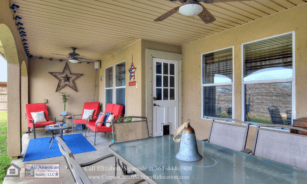 Homes in Corpus Christi TX - Entertain friends and enjoy al fresco meals on the covered patio of this home for sale in Corpus Christi TX. 