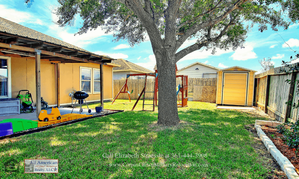 Homes in Corpus Christi TX - You’ll love the serene appeal of the spacious fenced yard of this Corpus Christi home for sale. 