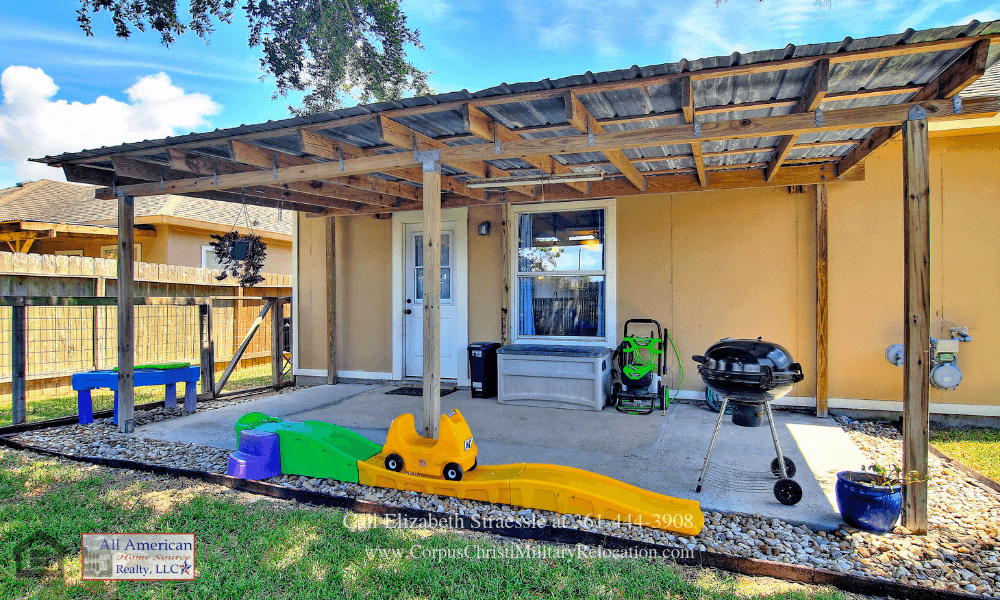 Corpus Christi TX Homes - Unwind and have fun with family and friends on the covered patio of this home for sale in Corpus Christi. 
