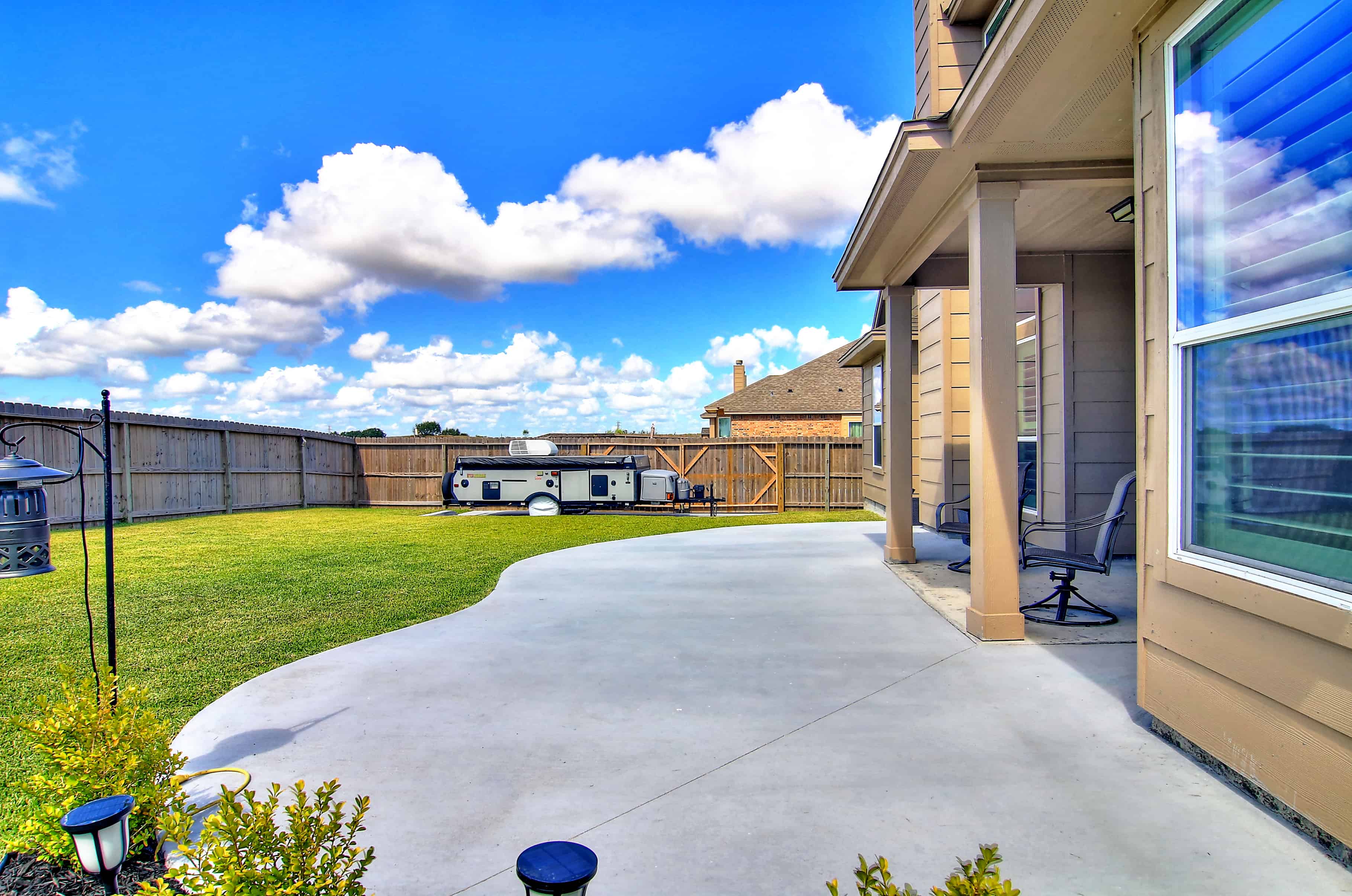 Real Estate Properties for Sale in Rancho Vista Corpus Christi TX - Relax and entertain in the large patio and backyard of this Corpus Christi TX home for sale. 